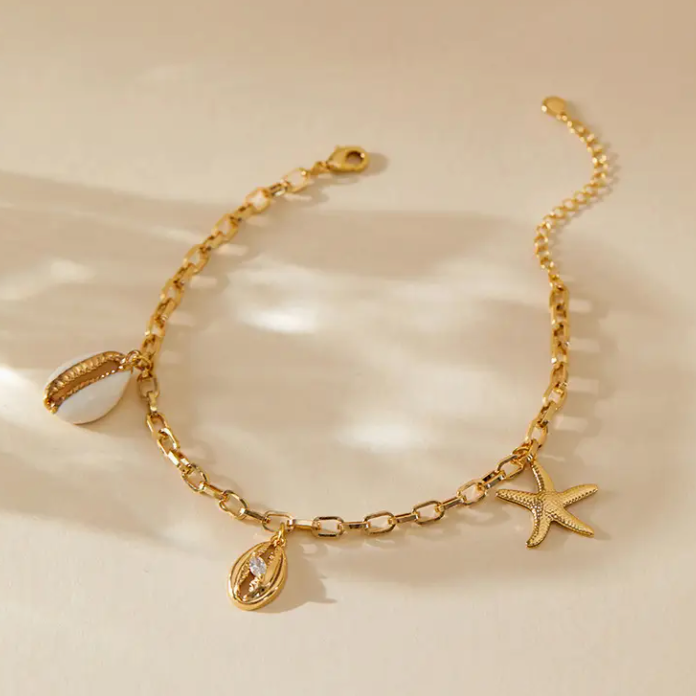 Lotta - Schakelarmband - Zeeschelp